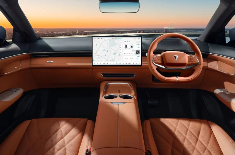Futuristic car interior with brown leather seats, a digital screen, and a sunset view.