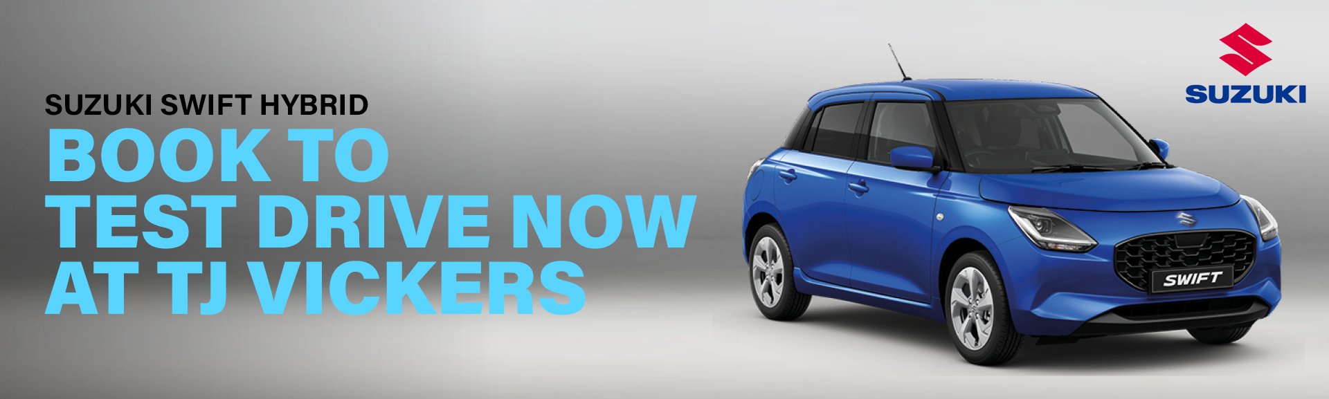 Blue Suzuki Swift Hybrid with text about test drive at TJ Vickers.